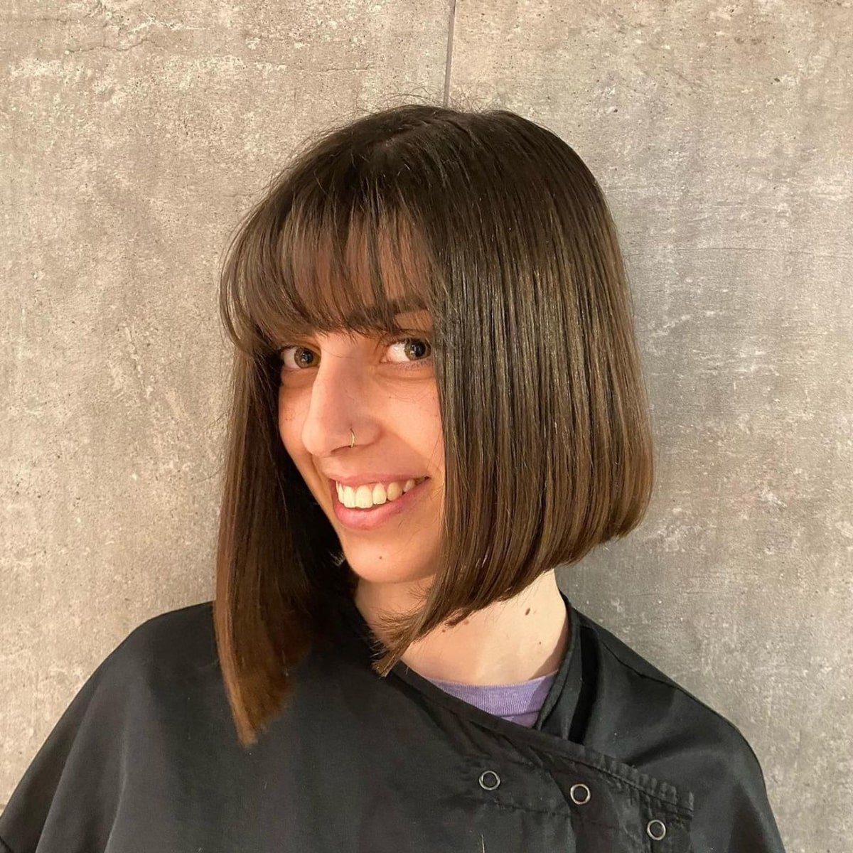 Asymmetrical blunt bob with bangs