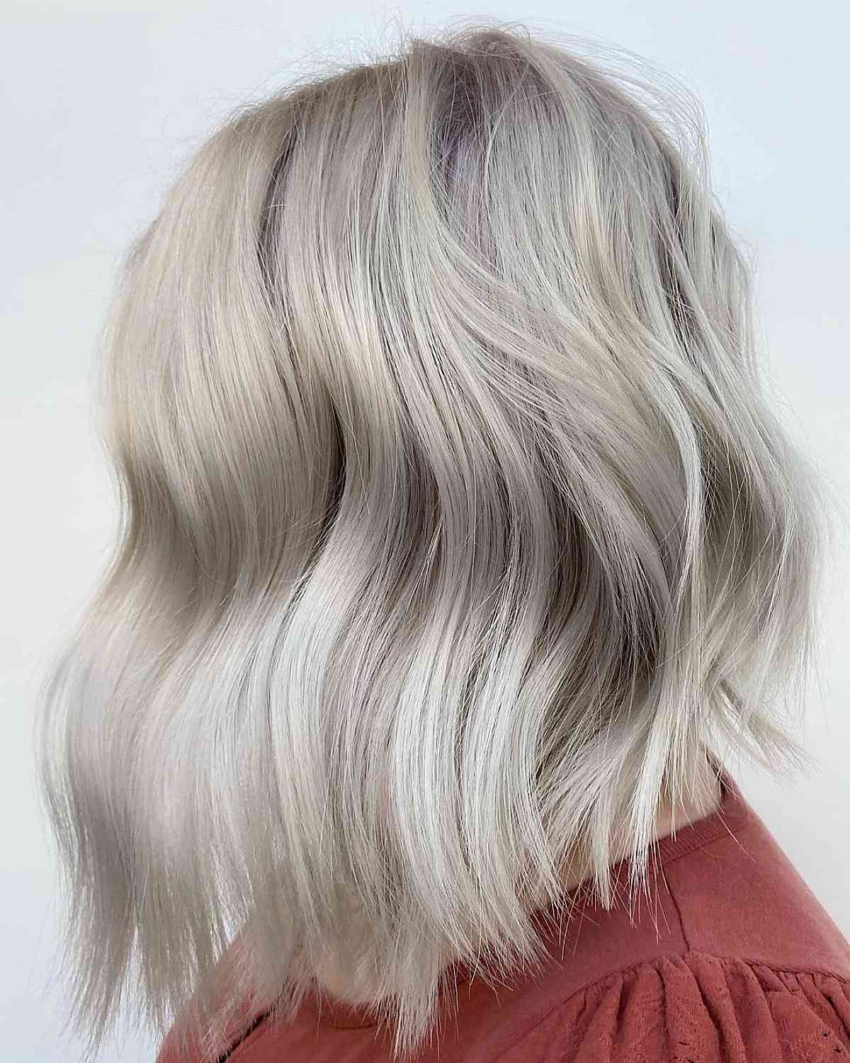 beach wavy long inverted blonde bob