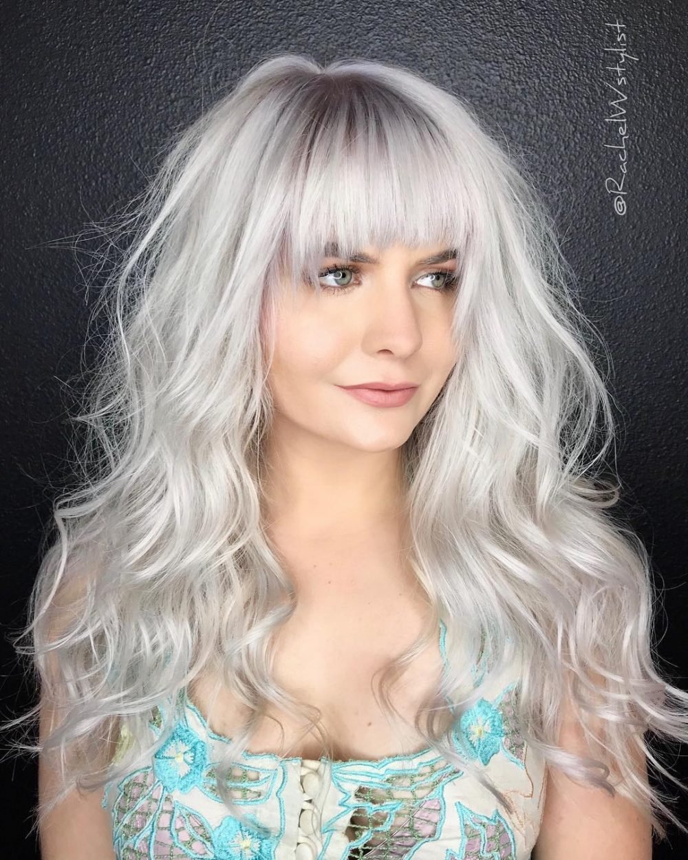 Long Platinum Blonde with Bangs