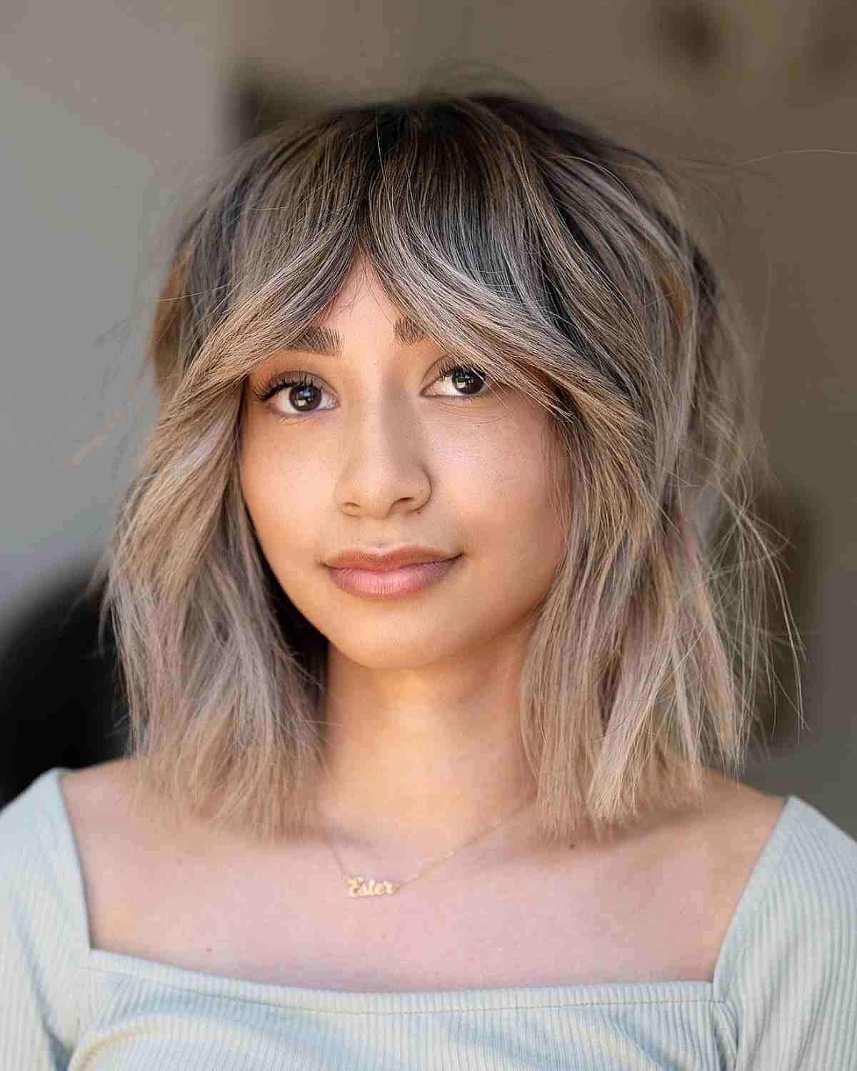 Blonde Balayage Shagged Bob with Curtain Bangs