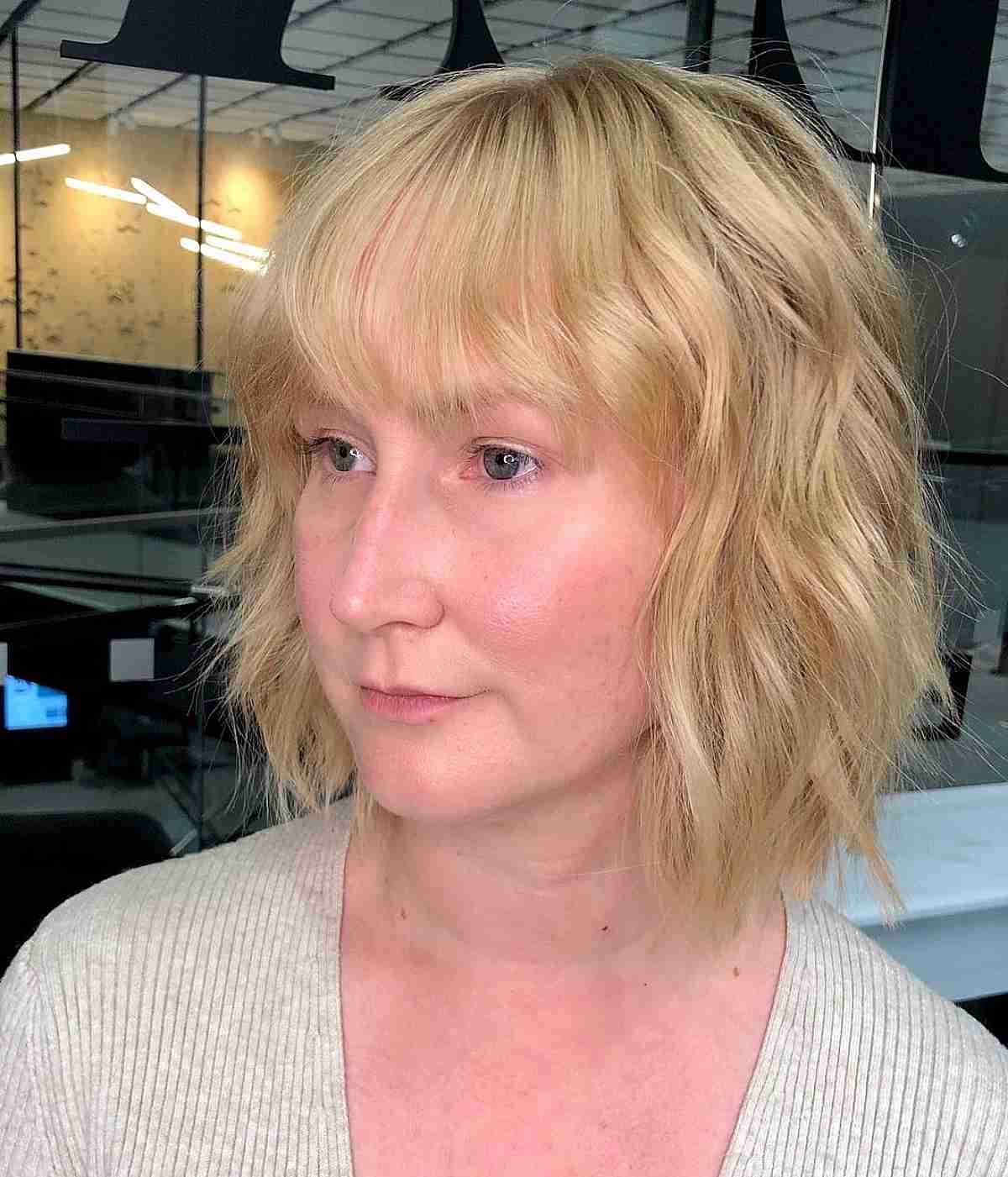 Sassy Blonde Textured Bob and Bangs for Thinning Hair