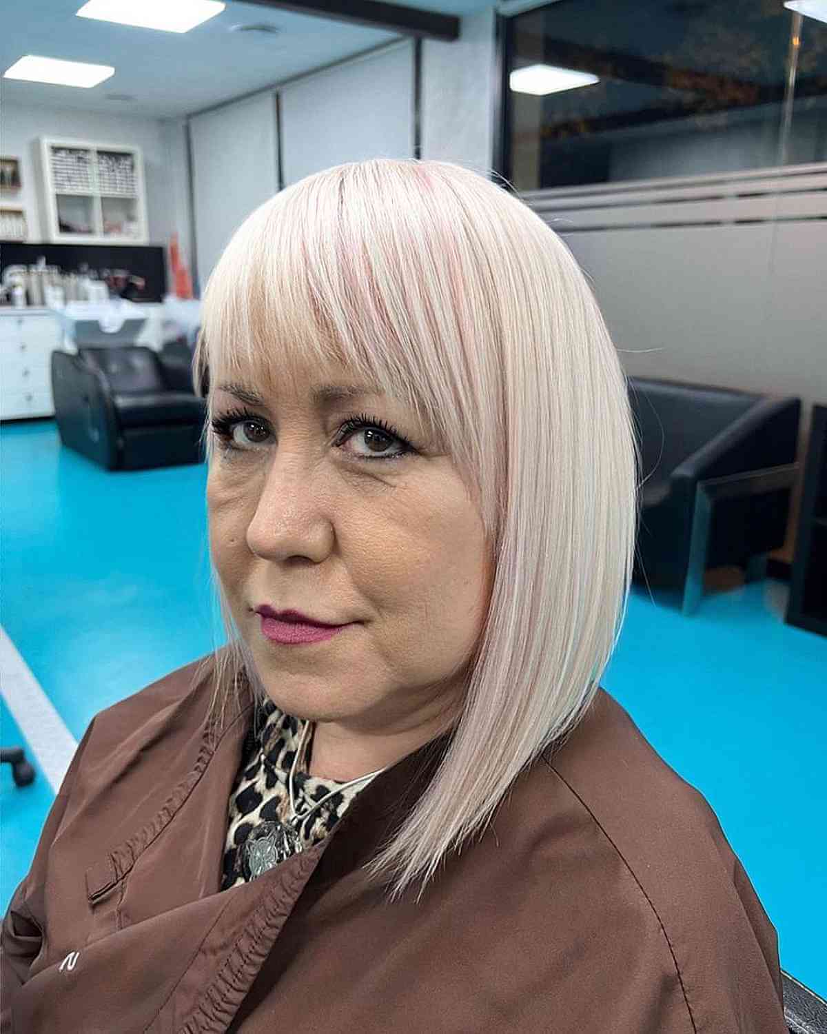 Bright Blonde Angled Bob with Fringe