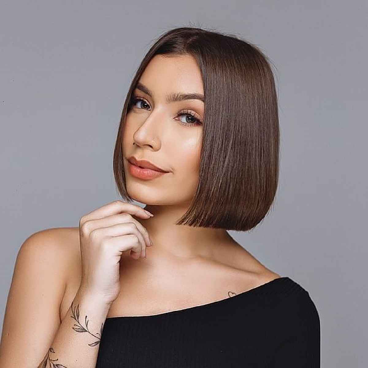 Brunette Blunt Bob with a Center Part