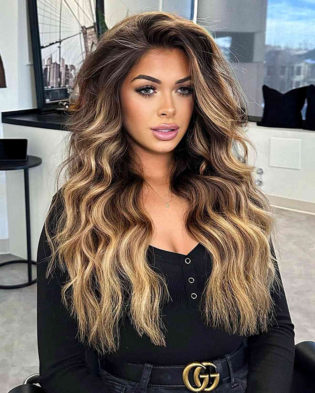 Caramel Blonde Balayage Highlights and Long Voluminous Waves for Dark Hair