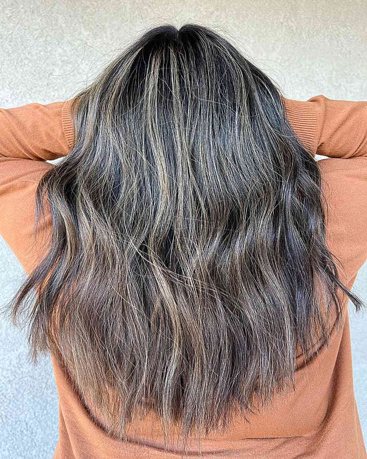 Choppy Long Dark Tresses with Subtle Blonde Balayage Highlights