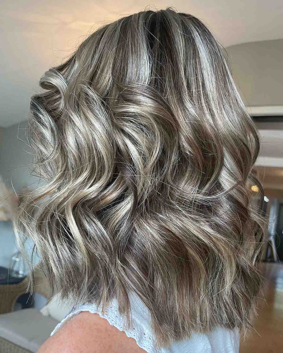 Curled Long Bob with Ash Blonde Hues