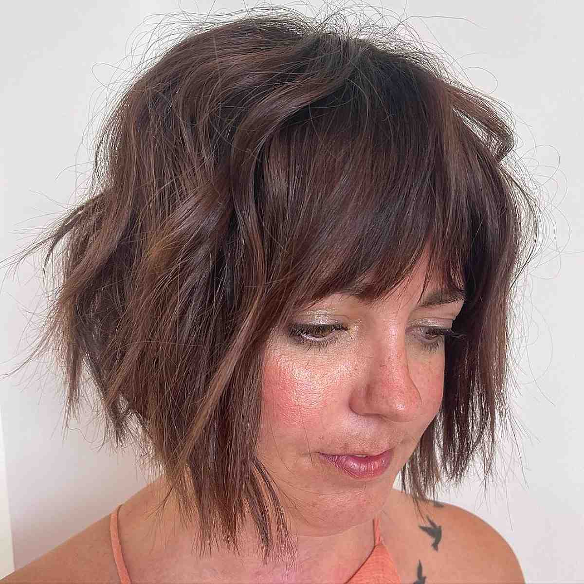 Effortless Face-framing short bob with bangs