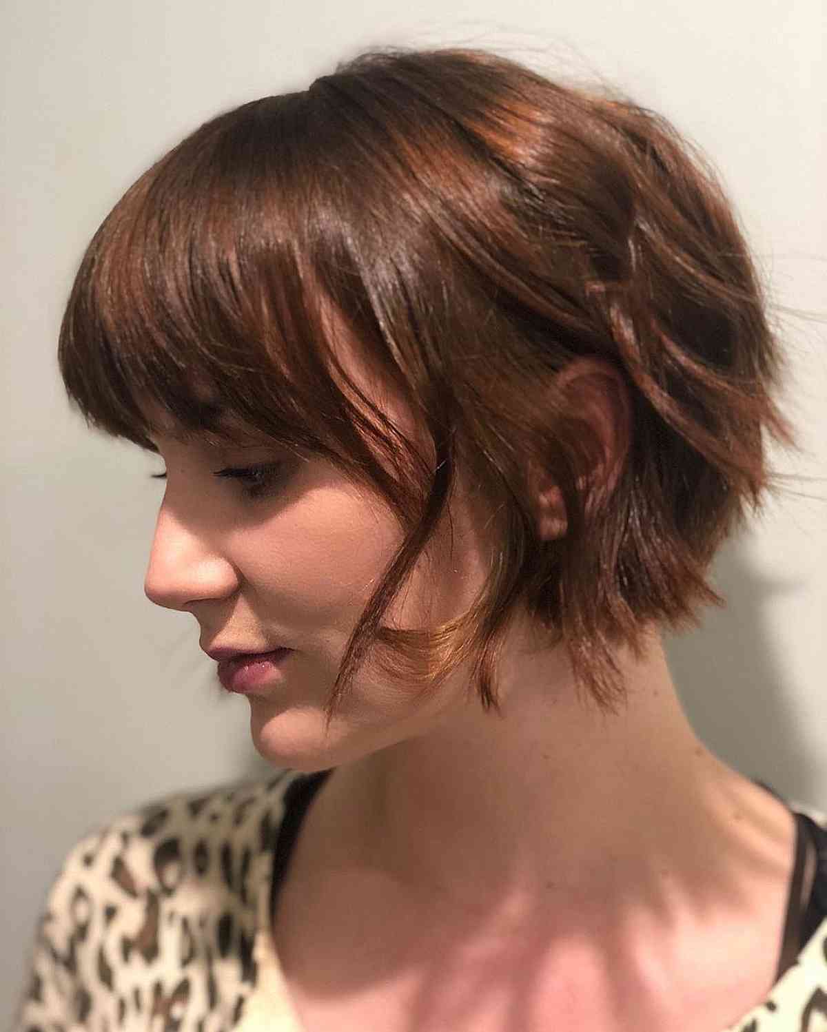 Jaw-Length Edgy Inverted Choppy Bob with a Fringe