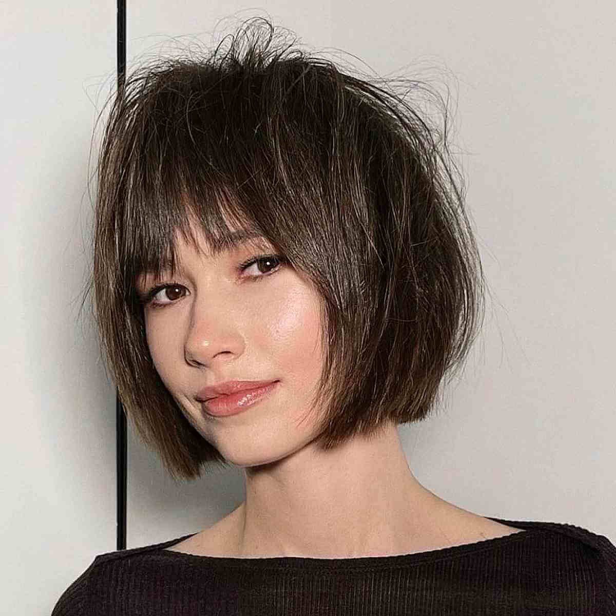 Jaw-Length Straight Messy Bob with Choppy Bangs