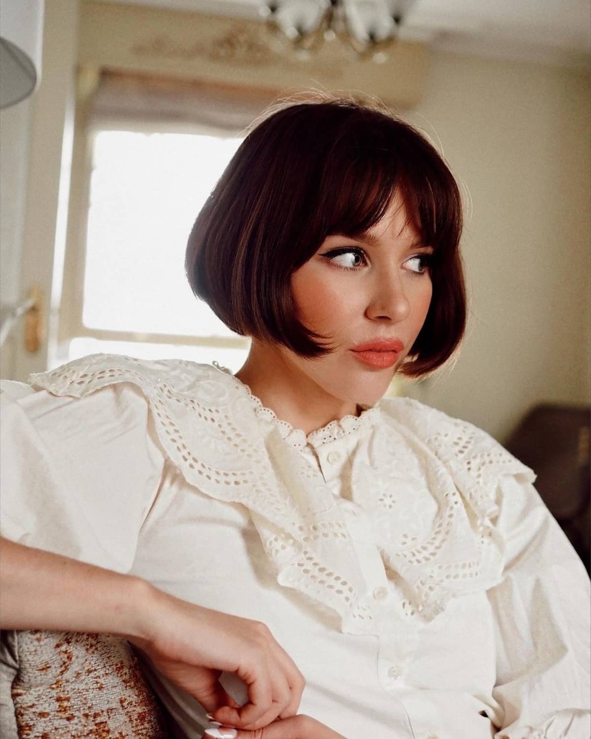 Jaw-Skimming Length French Bob with Curtain Bangs