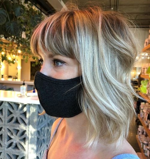 layered shaggy bob with bangs