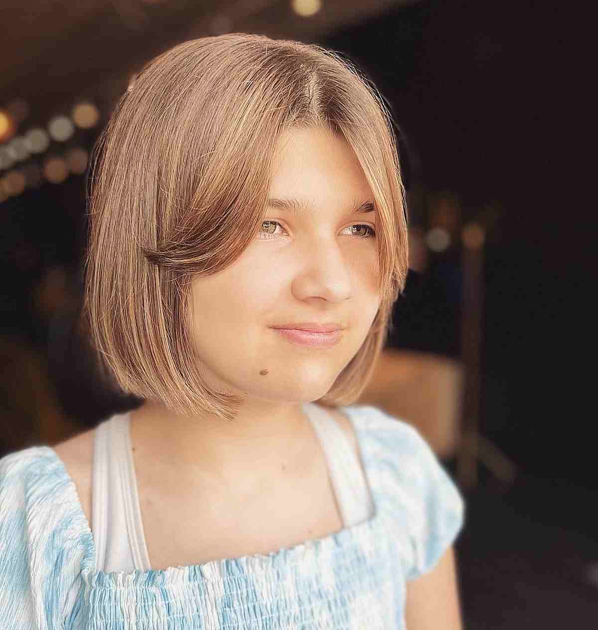 Classy Short Middle-Parted Bob Cut and a Curtain Fringe