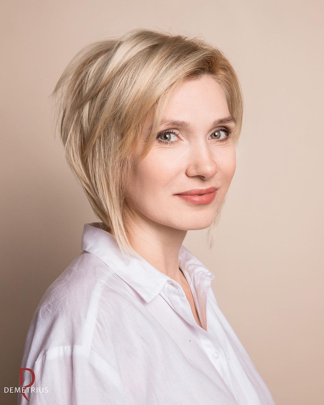 Modern blonde inverted lob for women over 40