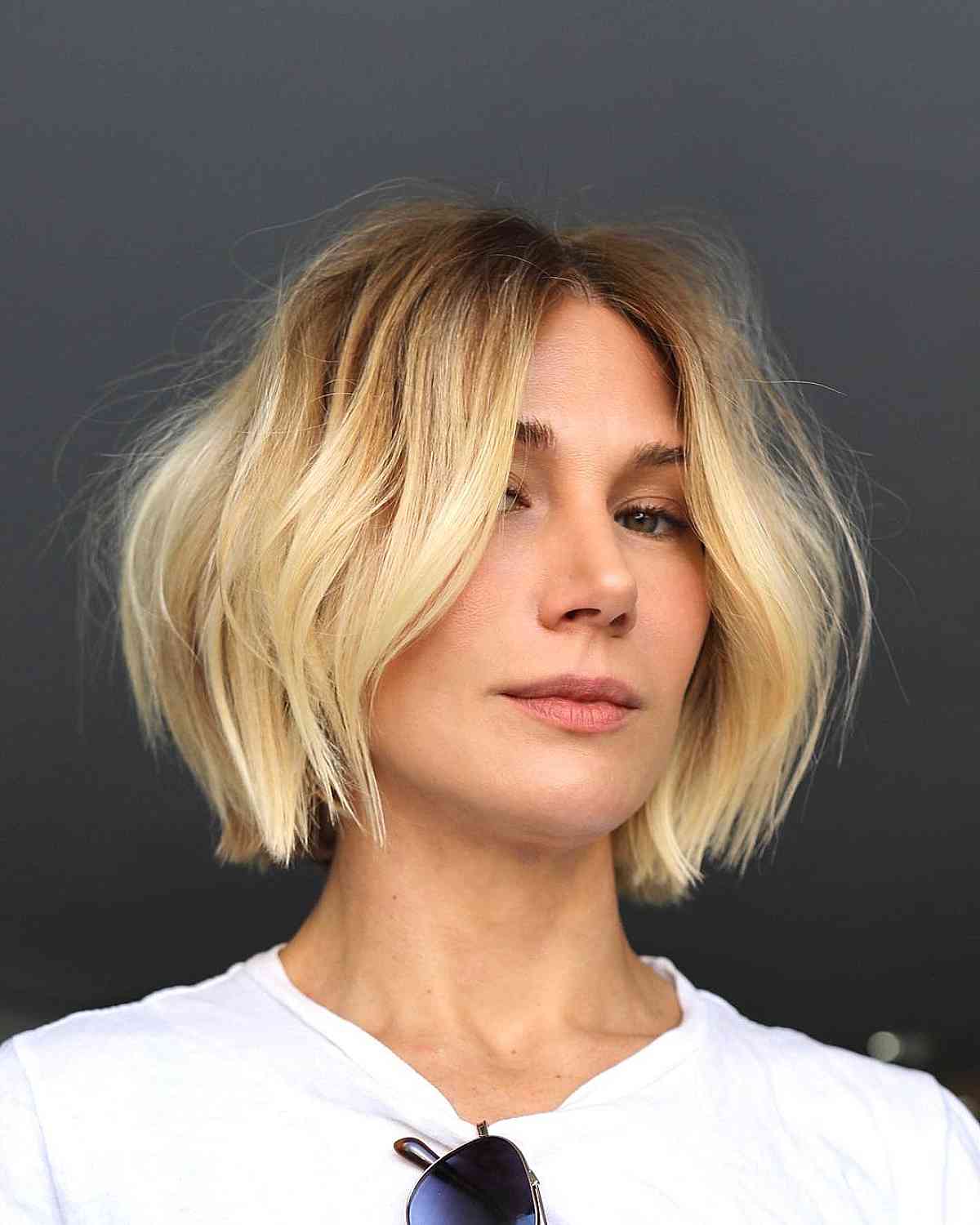 Modern Blonde Layered Bob with Dark Roots