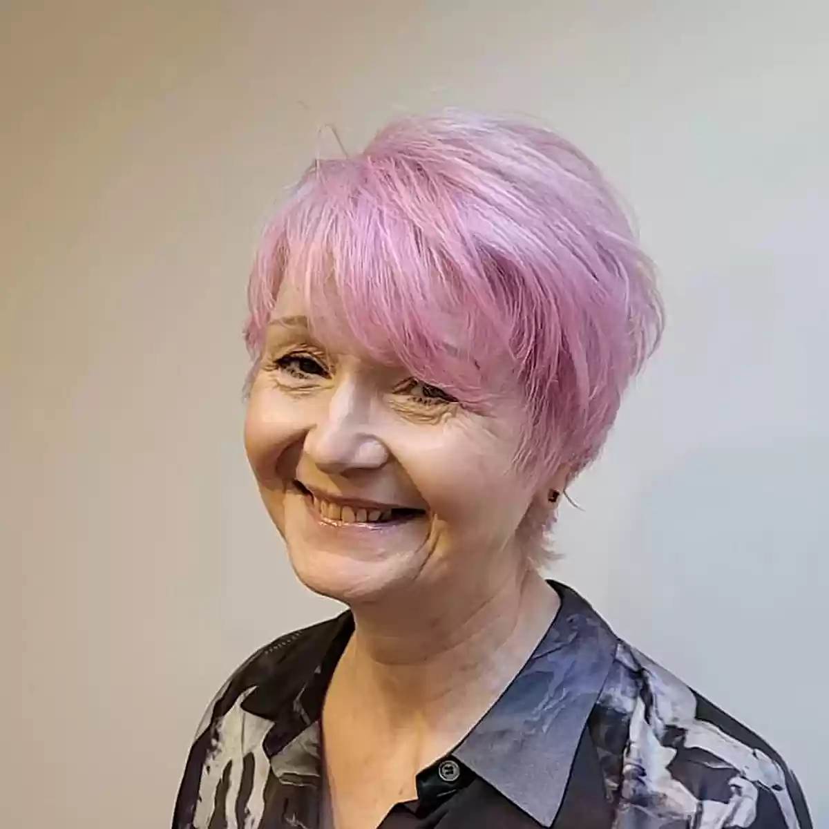 Pastel Pink on Wispy Pixie Bob Hair for older ladies in their 60