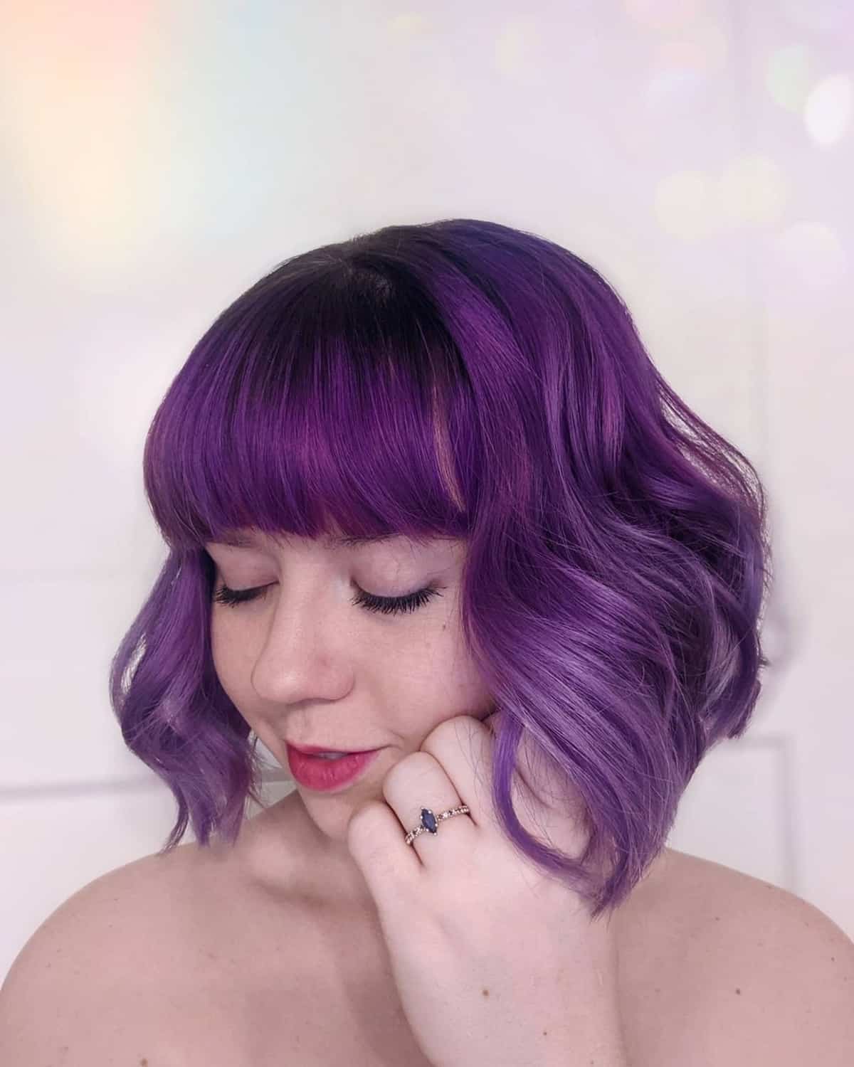 Purple angled blunt bob with fringe