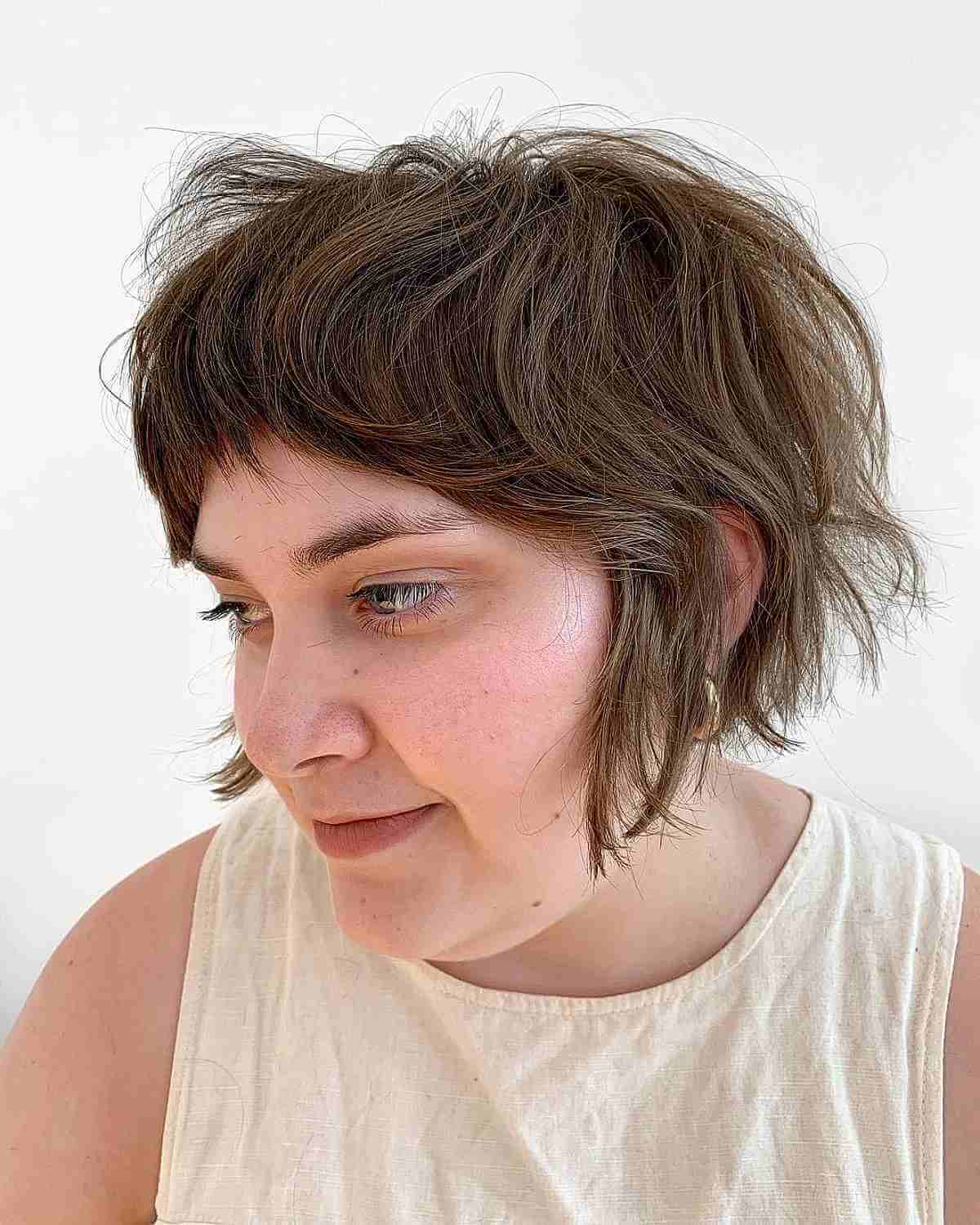 Razor Cut Brunette Shaggy Bob with Fringe