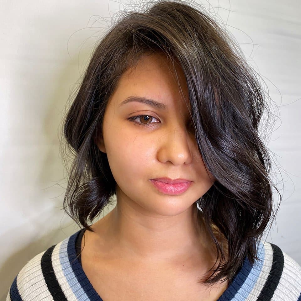 short asymmetrical wavy bob hairstyle