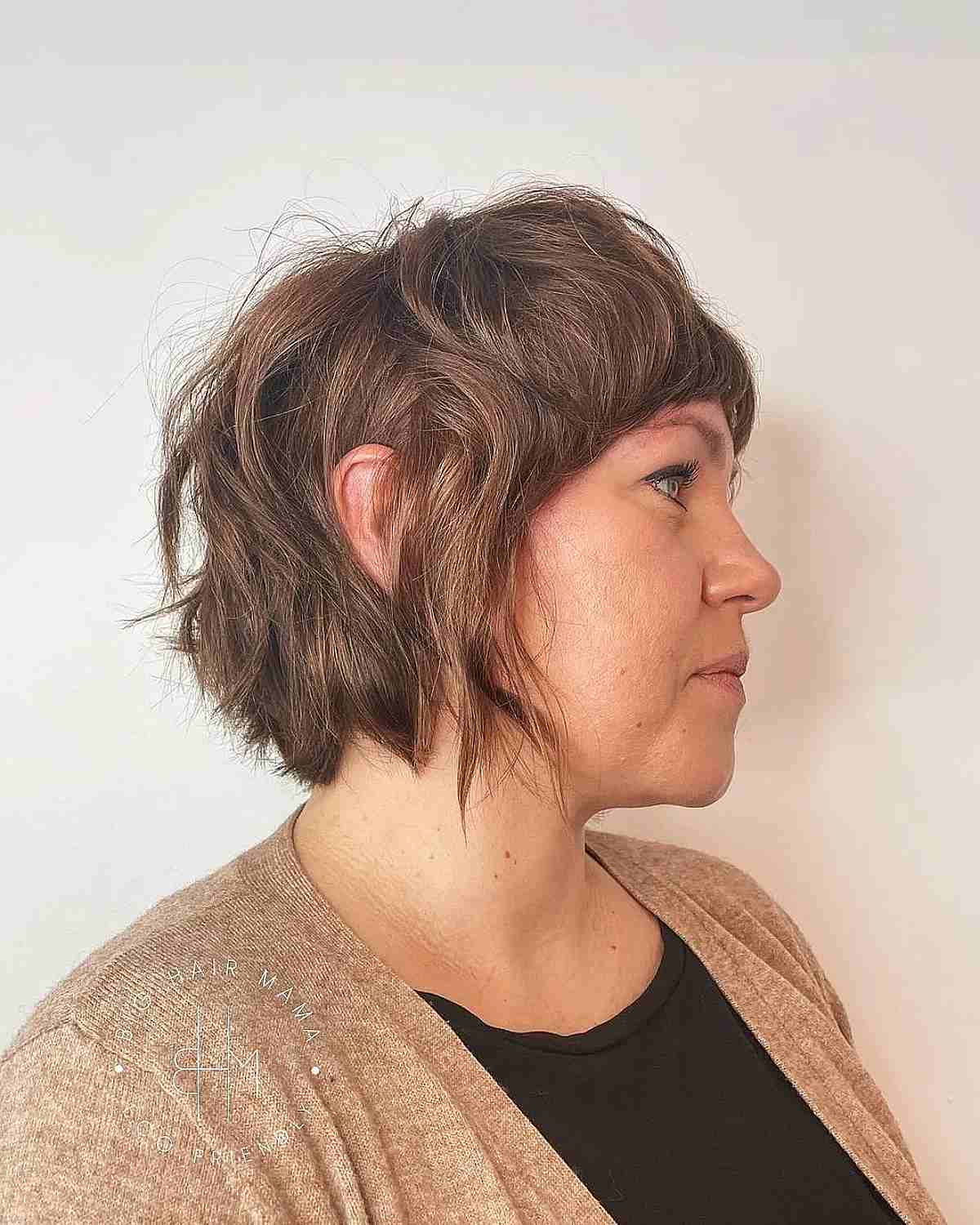 Short Chin-Length Disheveled Shag Mullet and Bangs