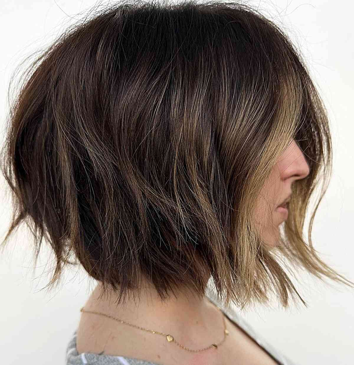 Short Choppy Bob with Lots of Volume and blunt ends with a money piece