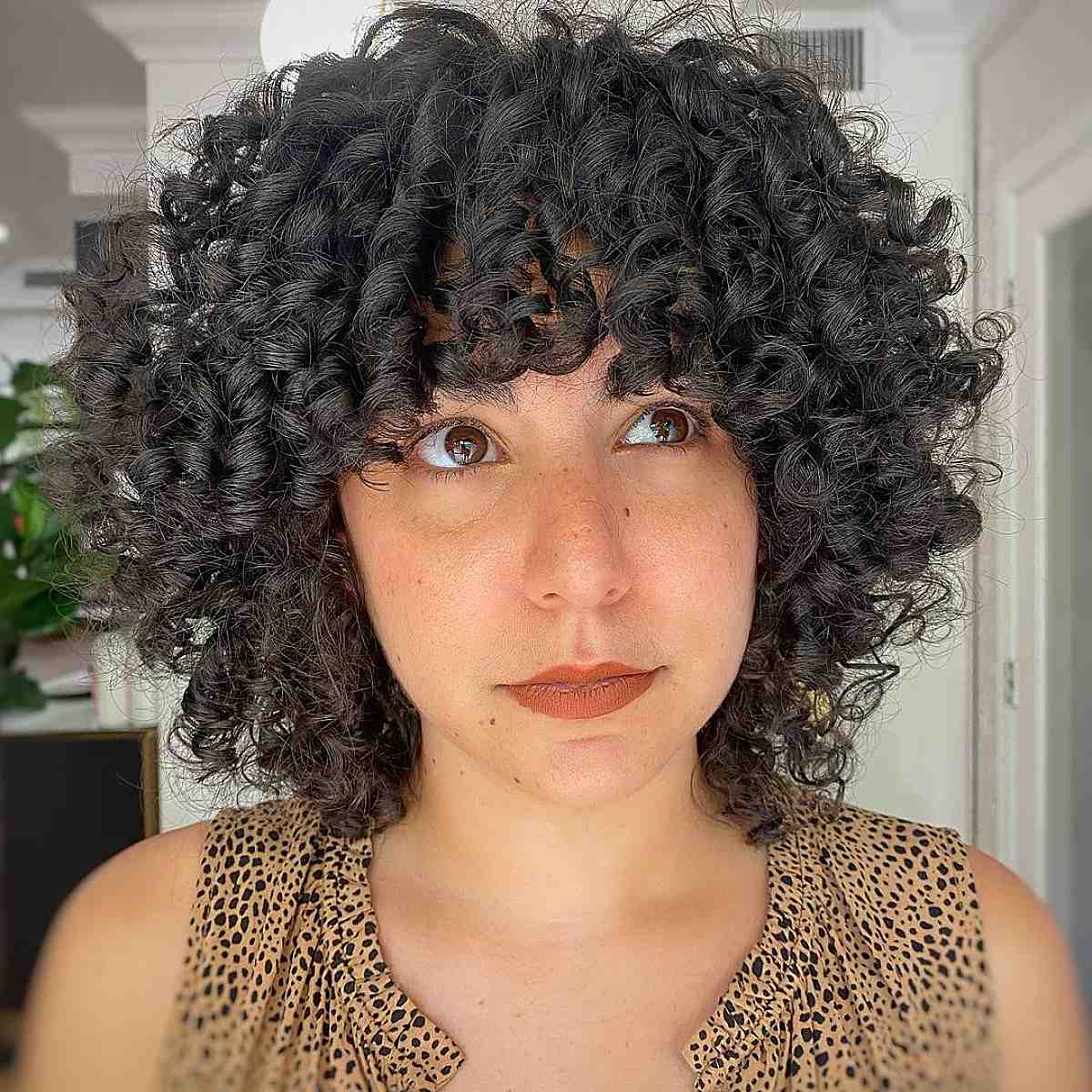 short curly bob with bangs