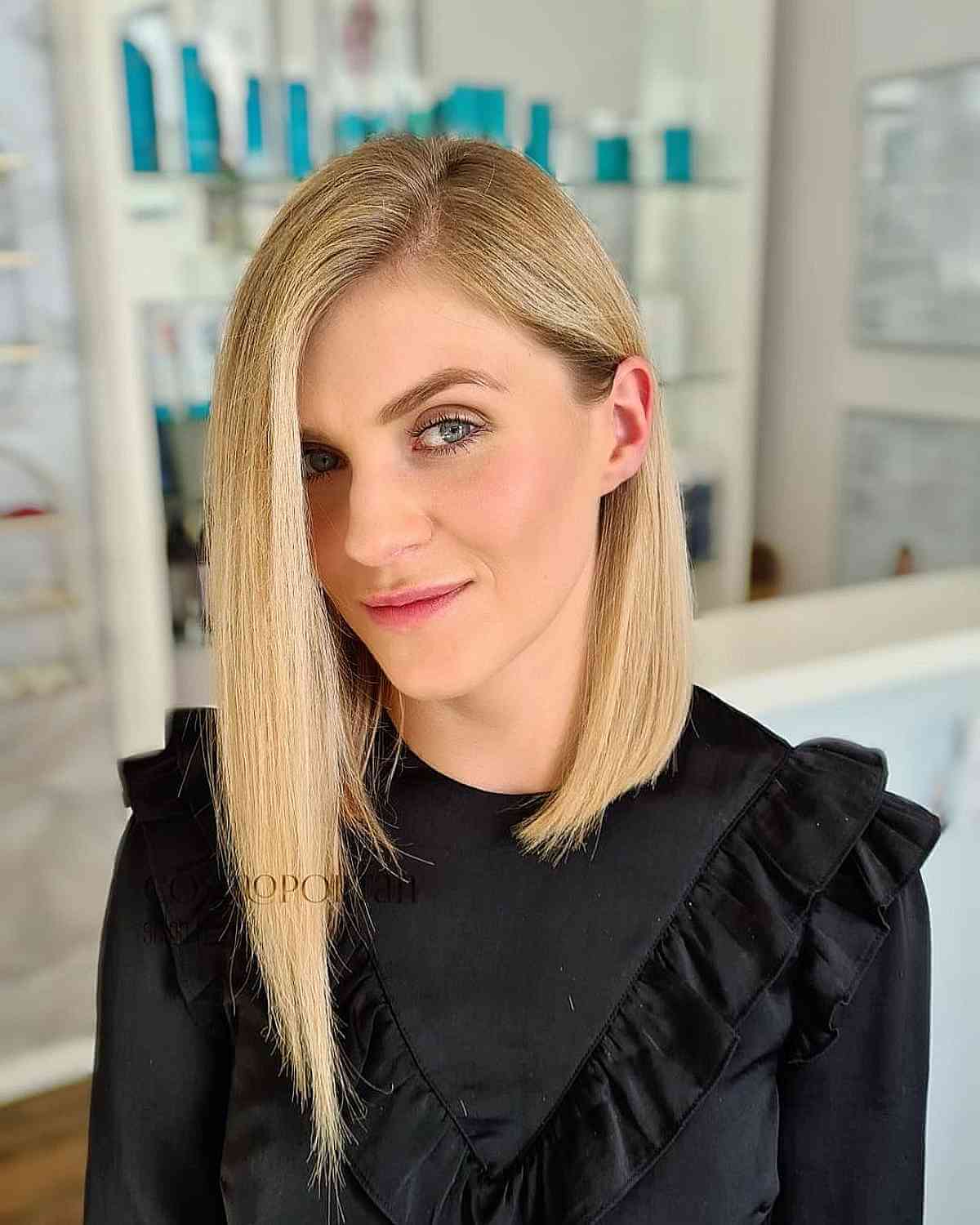 Sleek Blonde Long Asymmetric Bob