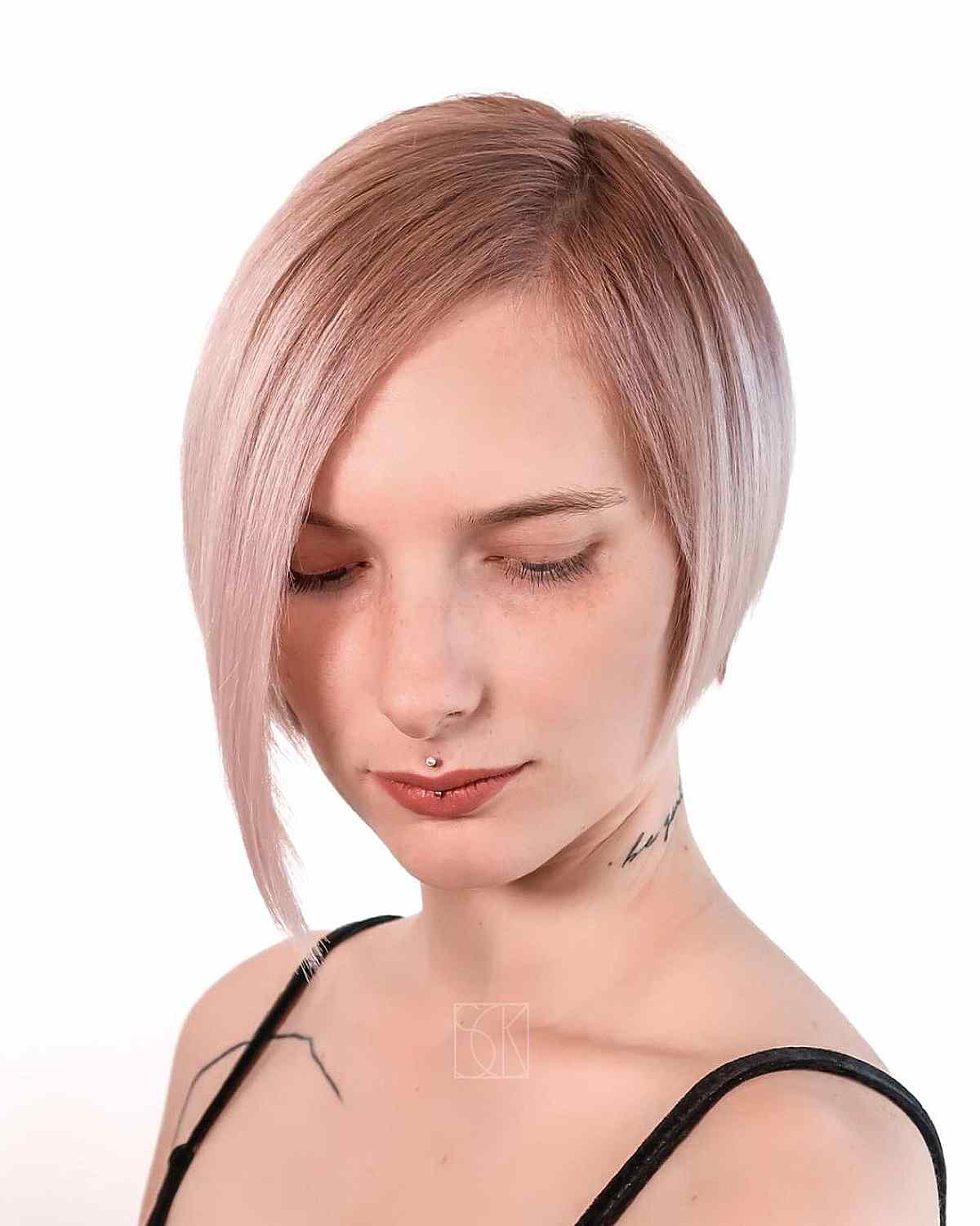 Sleek Light Pink Asymmetric Bob