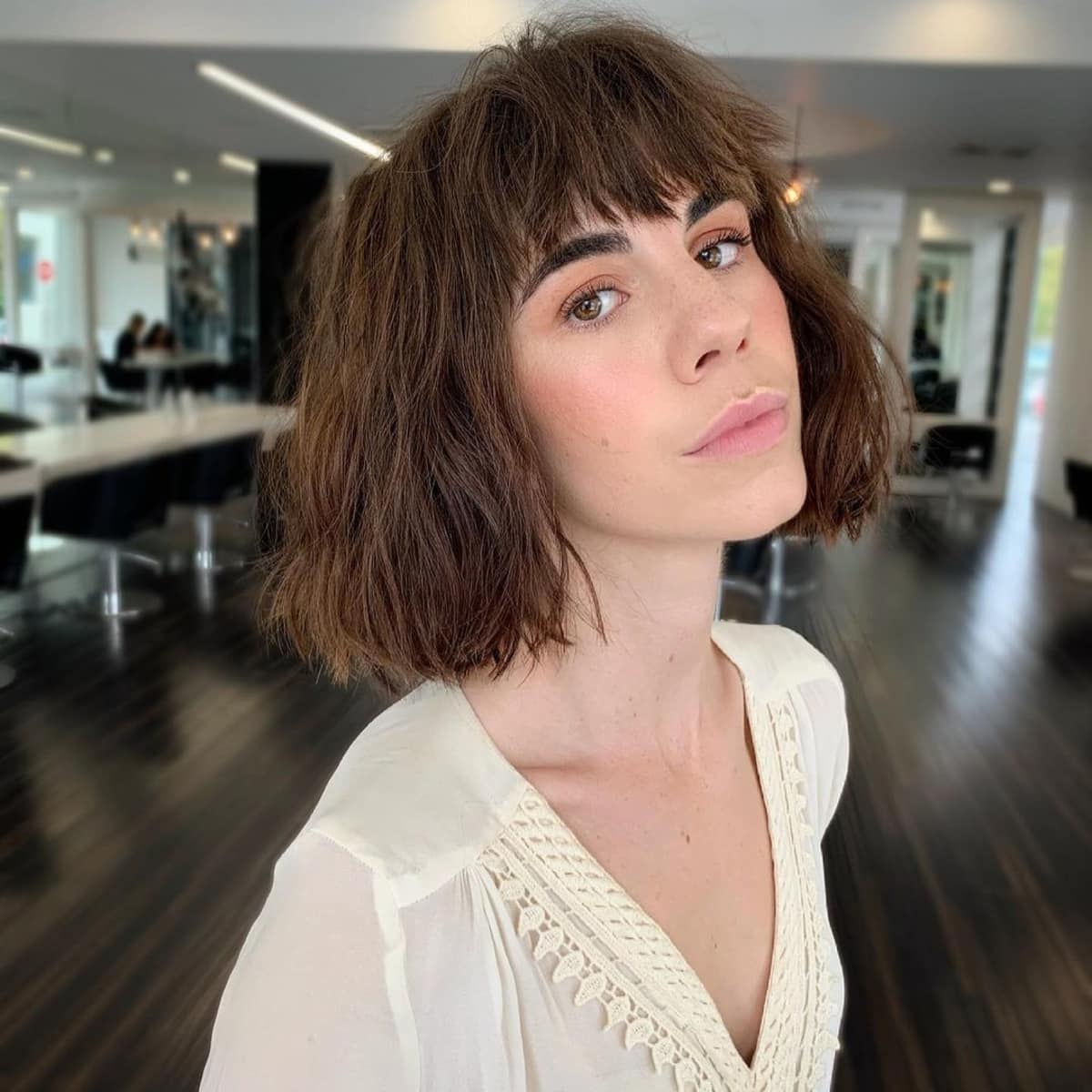 Trendy layered bob with bangs